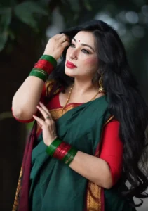 Dr. Sabrina in Green and Red saree